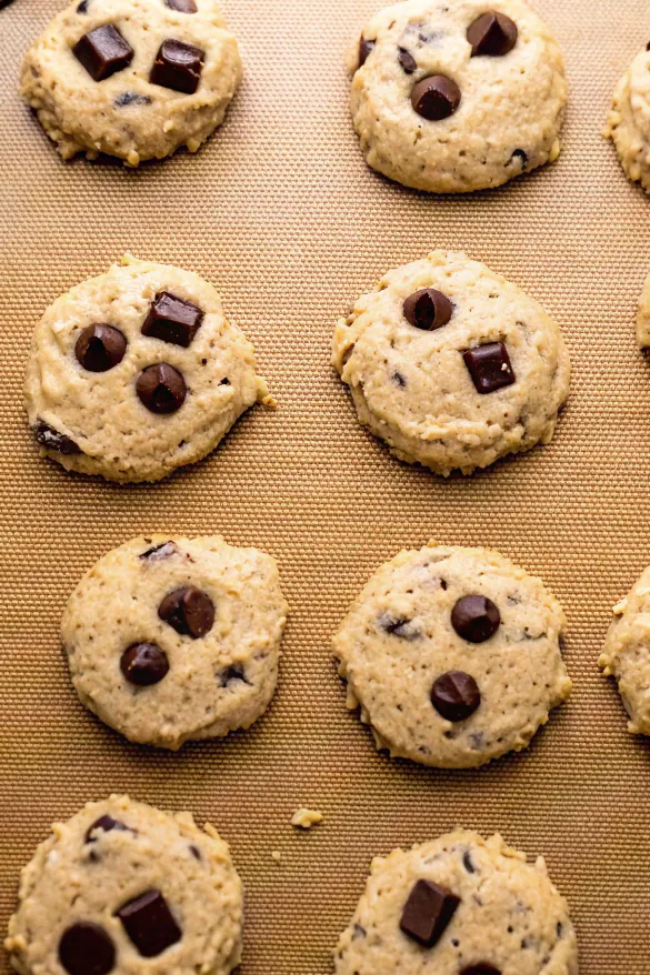Unbaked cookie dough on a baking sheet.