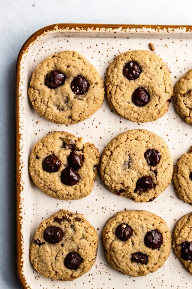 Chickpea chocolate chip cookies on a plate.