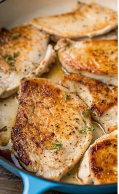 Pan-seared turkey chops with golden crust.